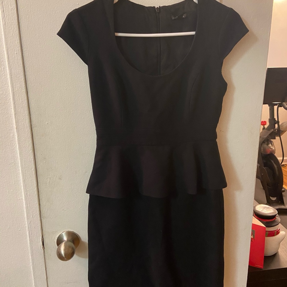 Black cap sleeve peplum dress
